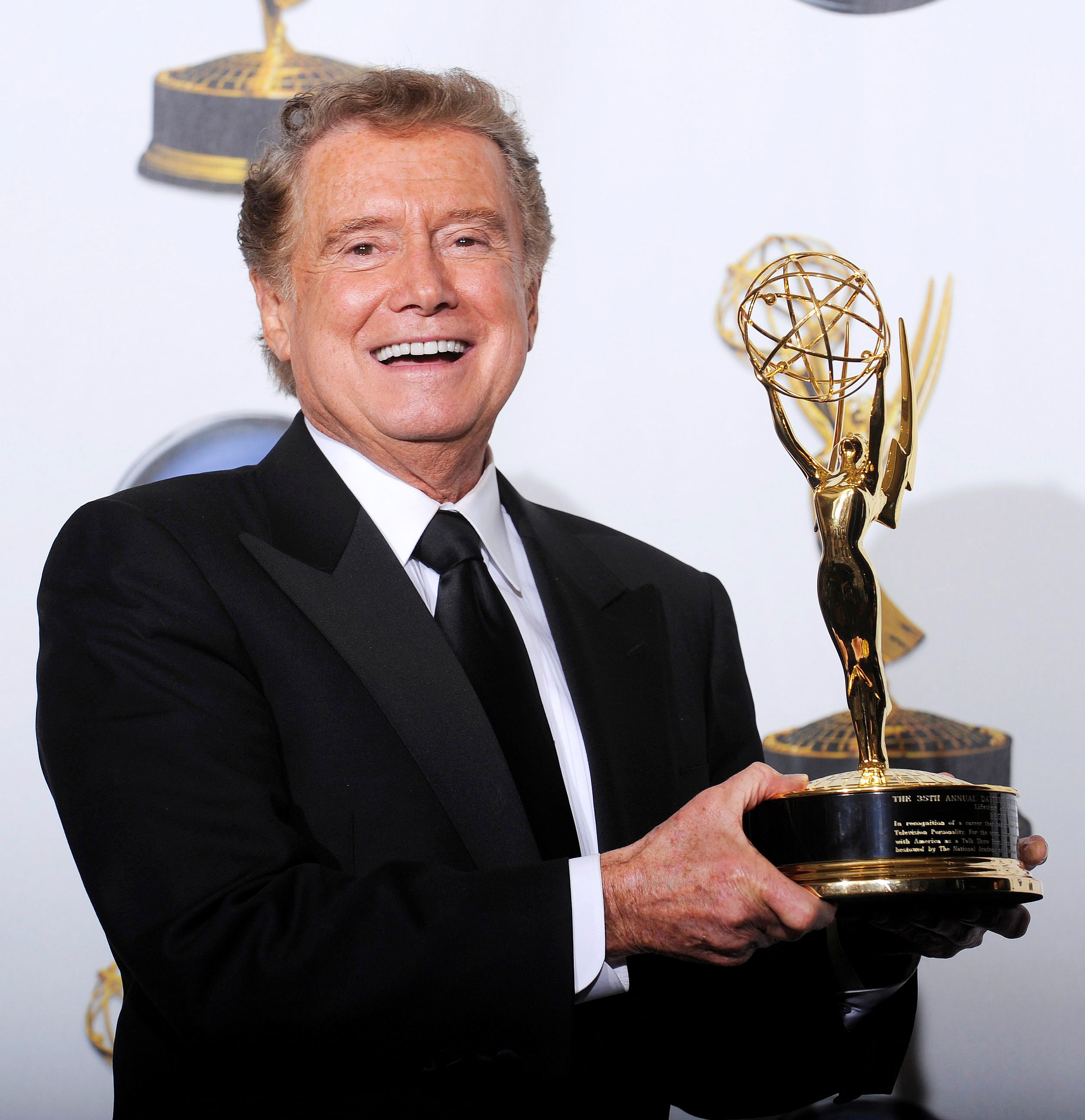 Regis Philbin poses with his lifetime achievement award backstage at the 35th Annual Daytime Emmy Awards at the Kodak theatre in Hollywood, California June 20, 2008. Credit: REUTERS File Photo