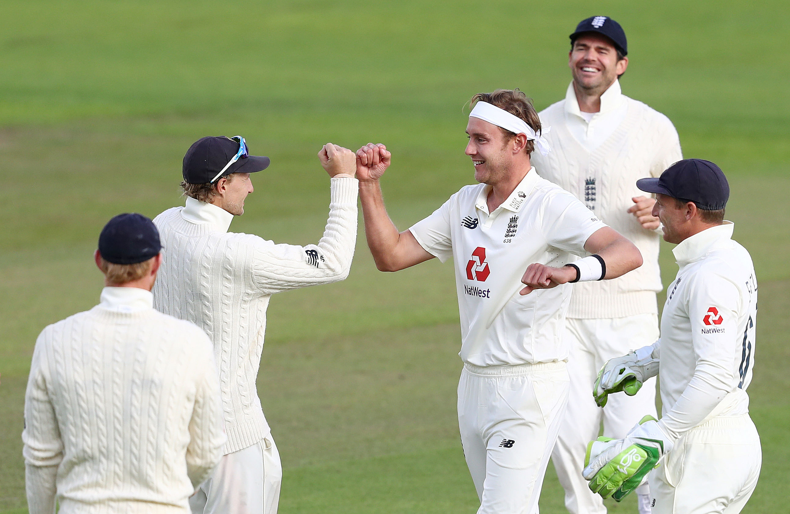 England's Stuart Broad celebrates taking the wicket of West Indies' John Campbell with teammates, as play resumes behind closed doors following the outbreak of the coronavirus disease (Covid-19). Credit: REUTERS Photo