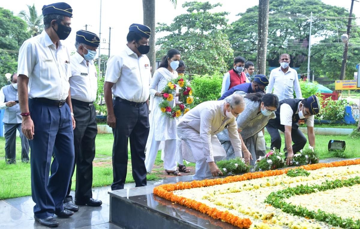 Dignitaries place wreaths at the war memorial in Kadri Hills, on account of Kargil Vijay Diwas, on Sunday.