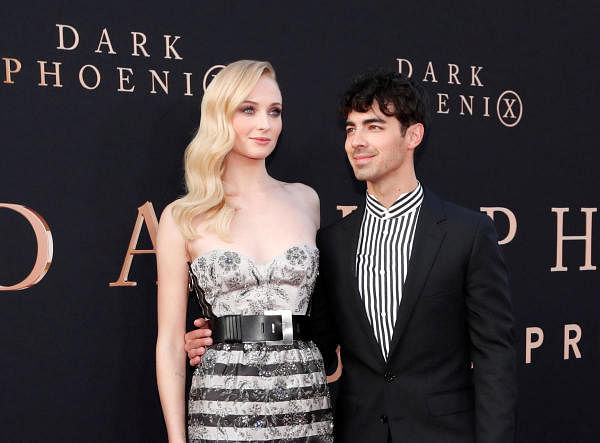 Actor Sophie Turner poses with her husband Joe Jonas. Credit: Reuters Photo