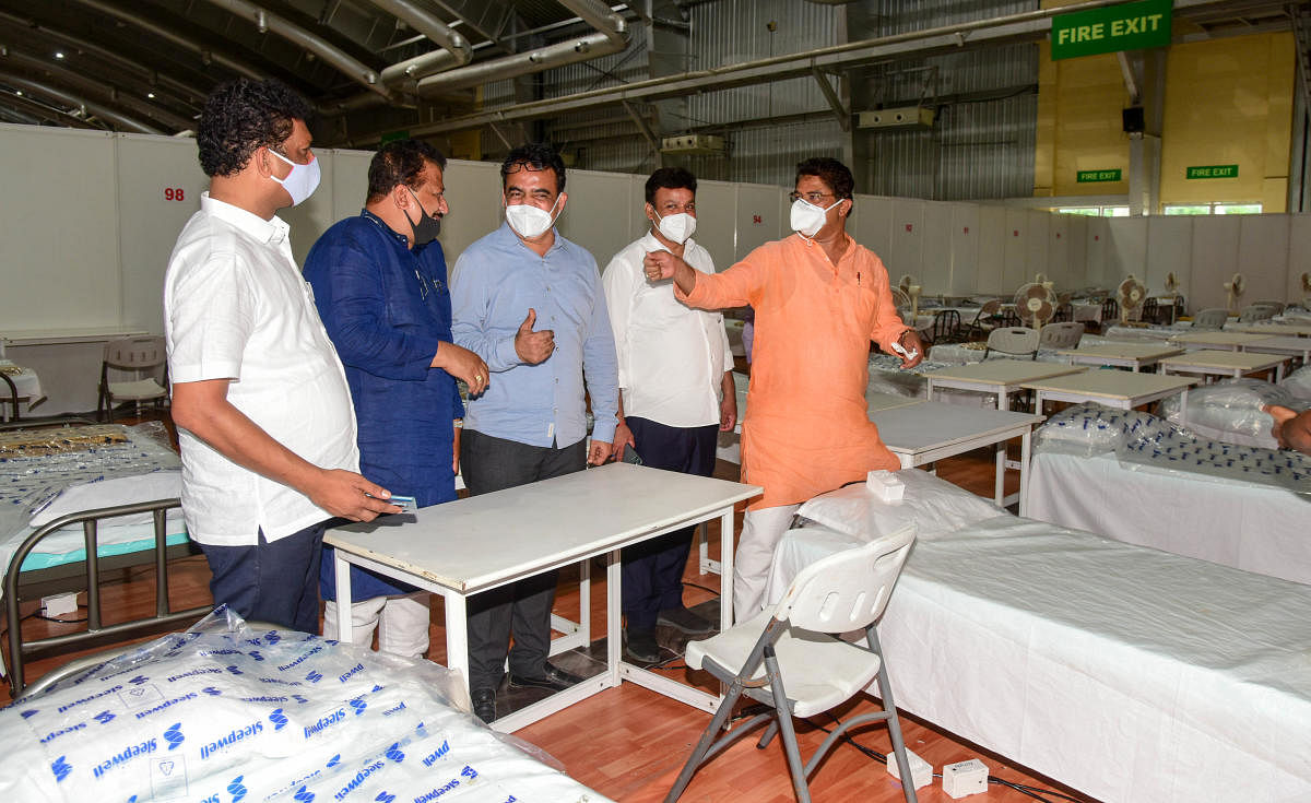 Deputy Chief Minister C N Ashwath Narayan, Revenue Minister R Ashoka and others during the inauguration of the Covid Care Centre at the Bangalore International Exhibition Centre (BIEC) on Monday. DH Photo/B H Shivakumar