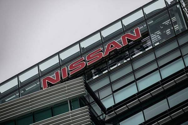Nissan signage is pictured on Nissan's global headquarters building in Yokohama. Credit: AFP Photo