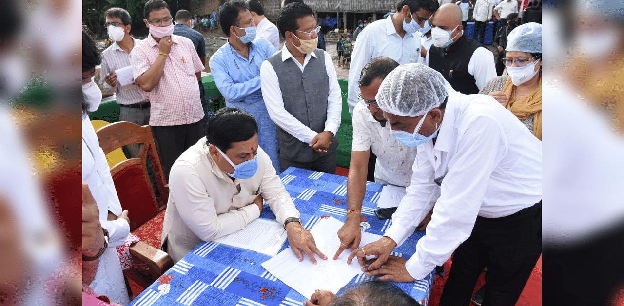 Assam CM Sarbananda Sonowal taking stock of flood situation in Lakhimpur district on Tuesday. Photo credit: Assam govt