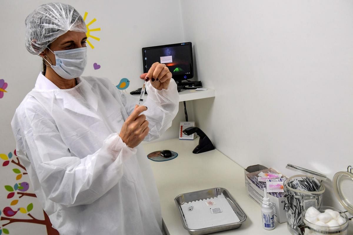 Brazilian pediatric doctor Monica Levi, one of the volunteers who received the COVID-19 vaccine. Credit: AFP