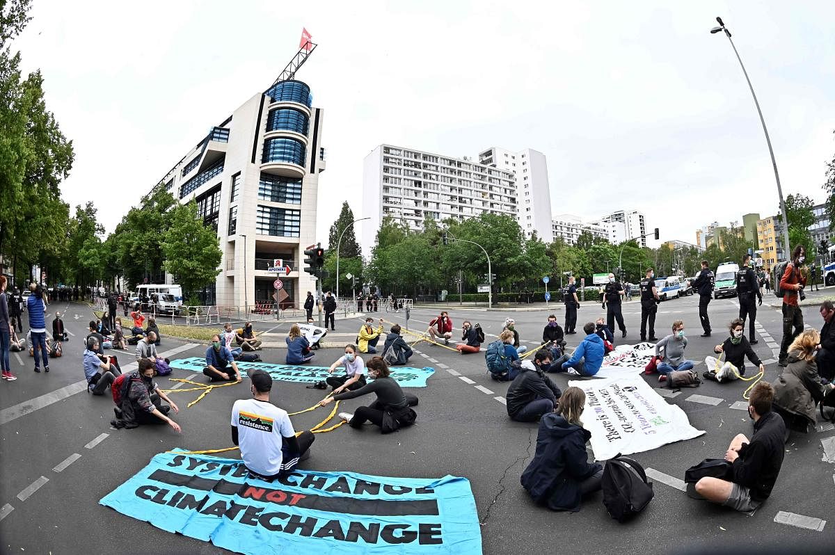 Environment activists protesting. Credit: AFP