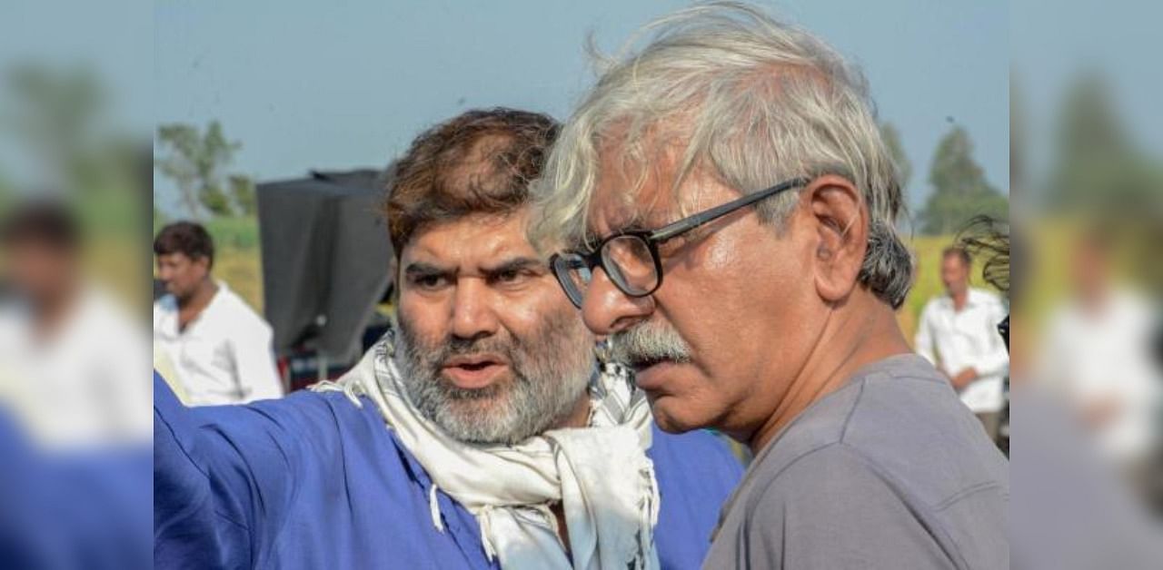 Actor Director Parvez Khan (L) along with filmmaker Sriram Raghavan during the shoot of Bollywood film 'Andhadhun'. Credit: PTI