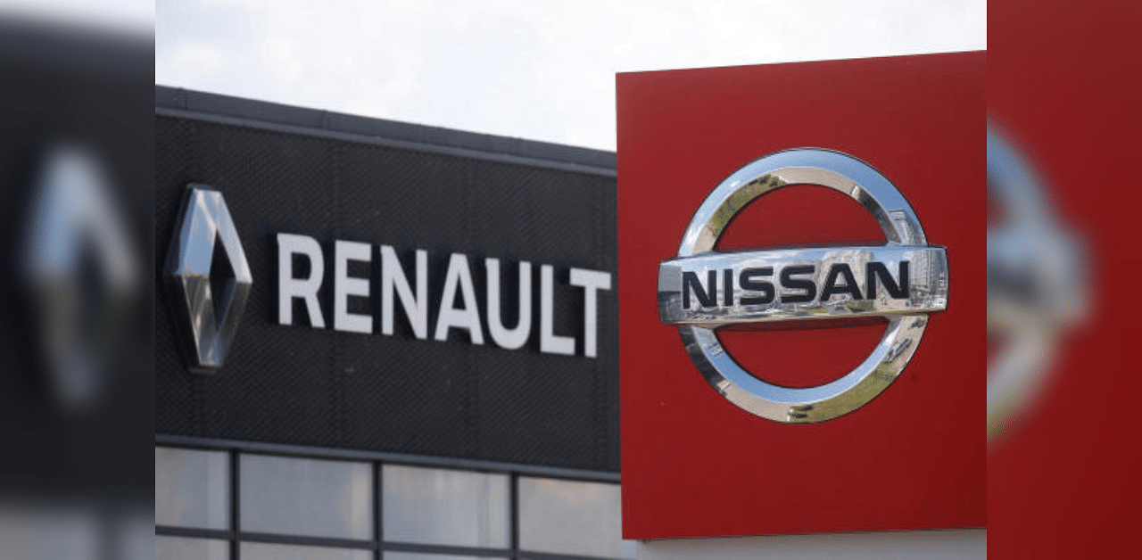 The logos of car manufacturers Nissan and Renault. Credit: Reuters Photo