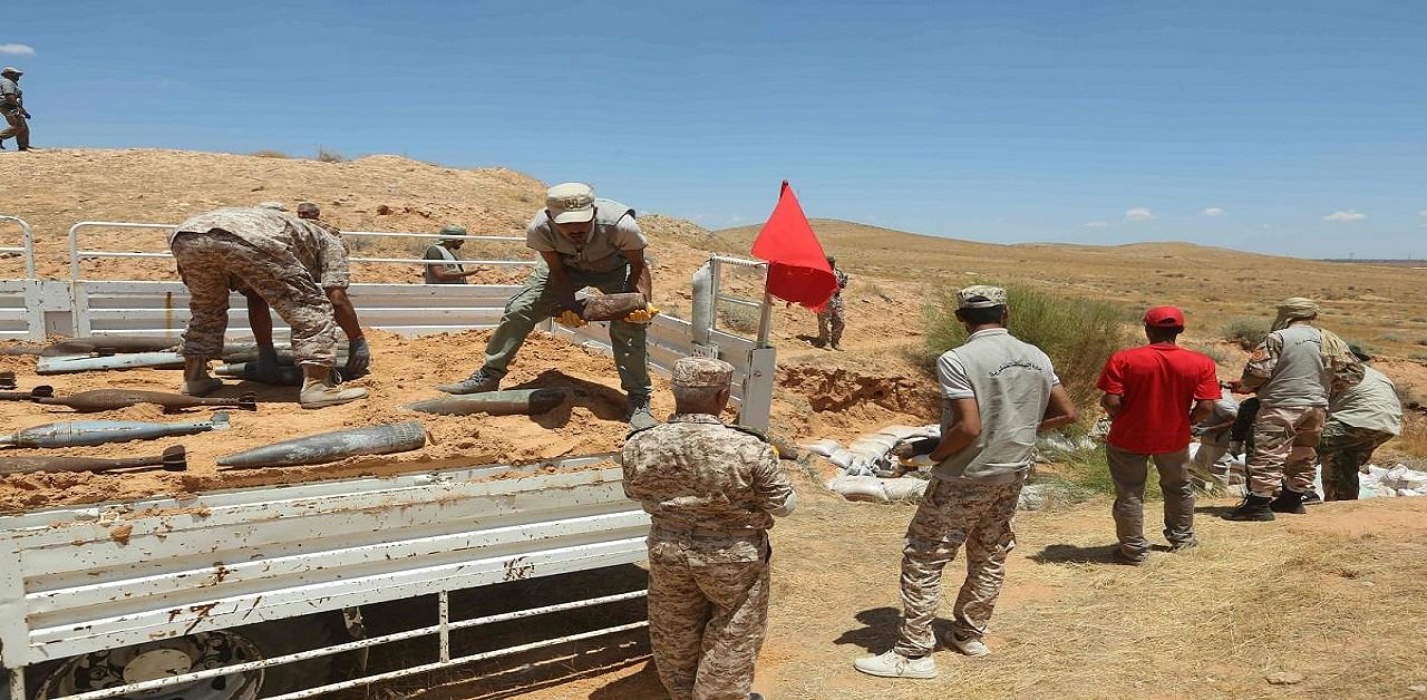  Mines have killed or wounded more than 100 people, including many civilians, south of Libya's capital following deadly combat between rival forces. Credit: AFP