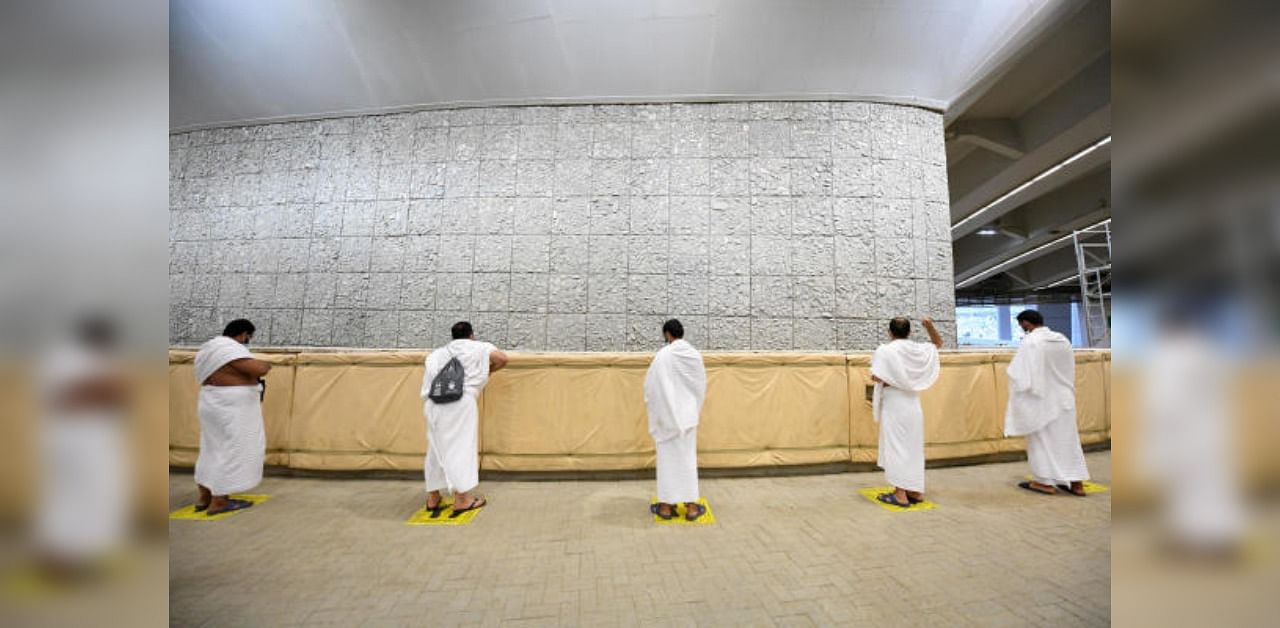 Muslim pilgrims following social distance cast stones at pillars symbolizing Satan during the annual Haj pilgrimage amid the coronavirus disease. Credit: Reuters
