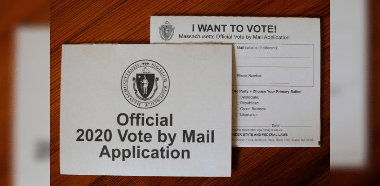 An "Official 2020 Vote by Mail Application" for the state of Massachusetts is displayed in a photo illustration. Credit: Reuters Photo