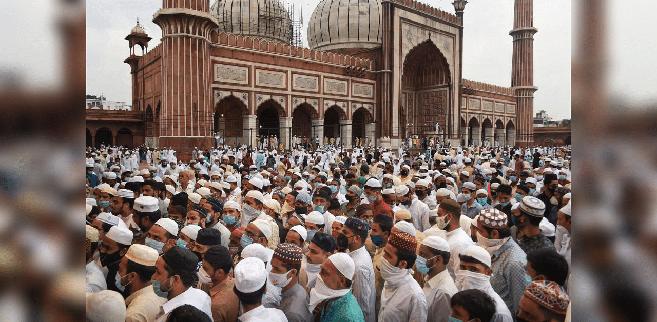  Members of the Muslim community leave after offering namaz on the occasion of Eid al-Adha, at Jama Masjid in New Delhi. Credit: PTI Photo