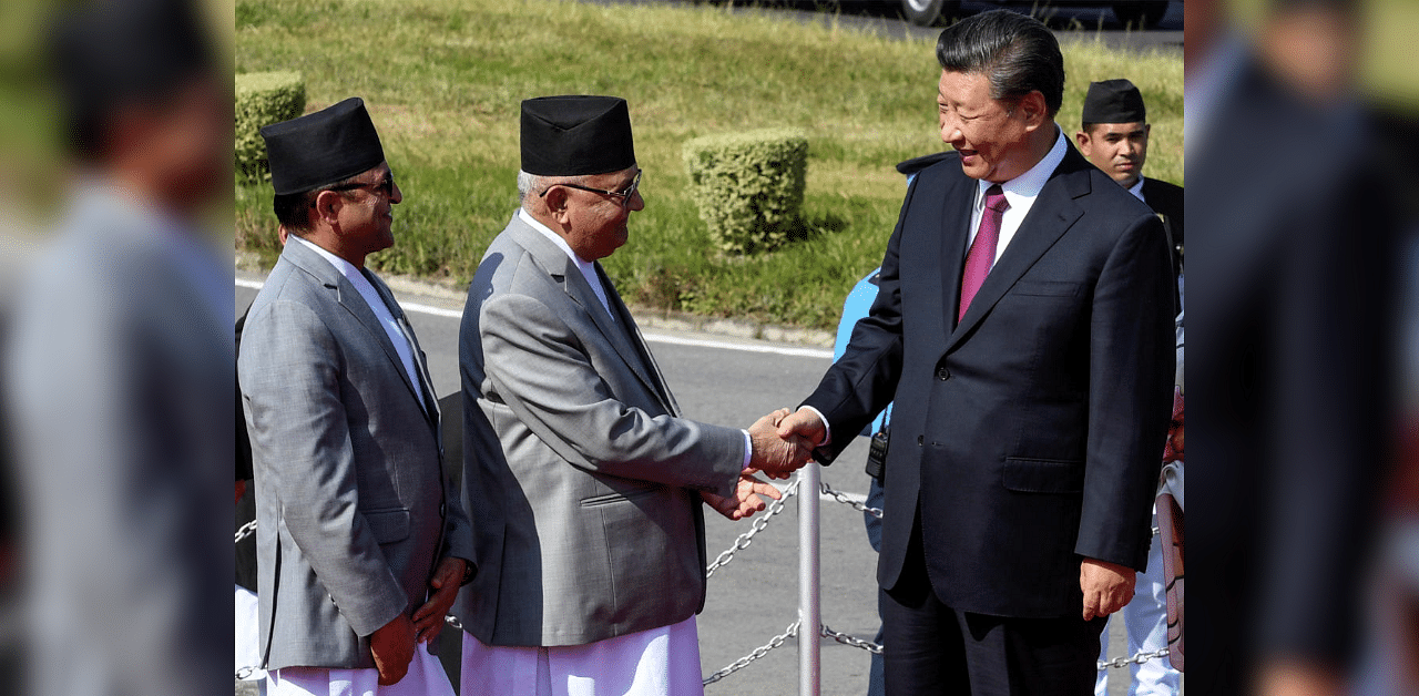 China's President Xi Jinping with Nepal's Prime Minister KP Sharma Oli in 2019. Credit: Reuters Photo