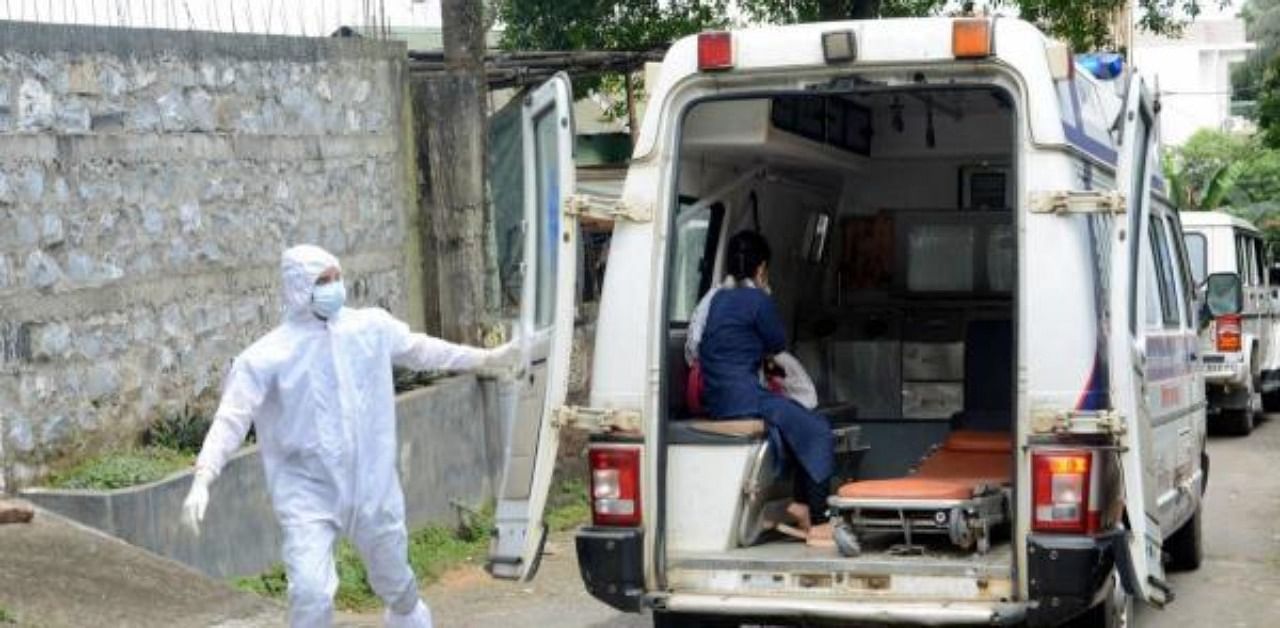 A suspected Covid-19 woman being taken to a hospital during the lockdown imposed by the state government to curb the spread of the novel coronavirus, in Guwahati. Credit: PTI