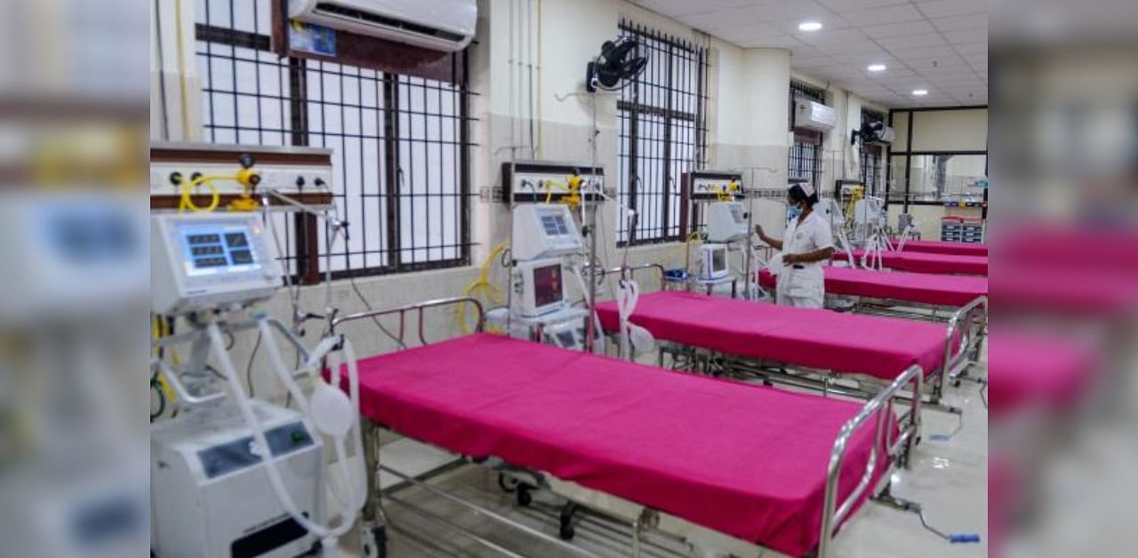 A medical staff checks on a ventilator of an intensive care unit. Credit: AFP Photo