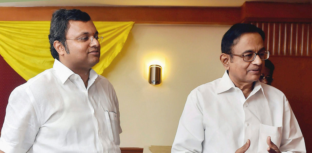 Former finance minister P Chidambaram with his son Karti P Chidambaram during a press conference in Chennai. Credit: PTI/ file