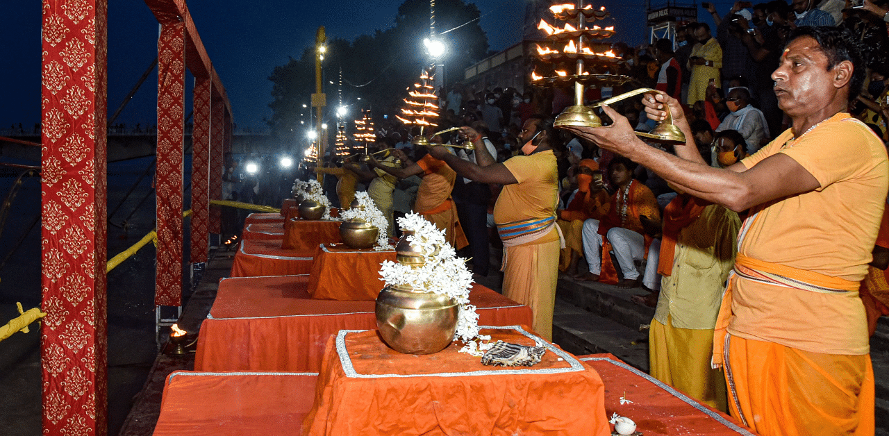 Devotees perform 'aarti' on the banks of Saryu river, in Ayodhya. Credits: PTI Photo