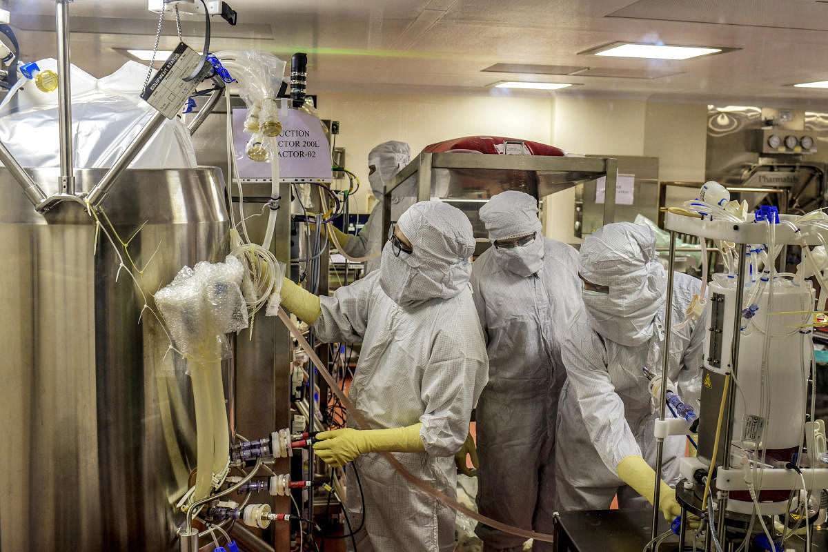 Researchers from Serum Institue work on a bioreactor to manufacture a possible Covid-19 vaccine, still in clinical trials, in Pune. The New York Times