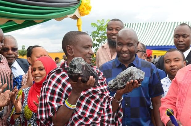 Laizer holding stones in both hands. Credit: Tanzanian Ministry of Minerals