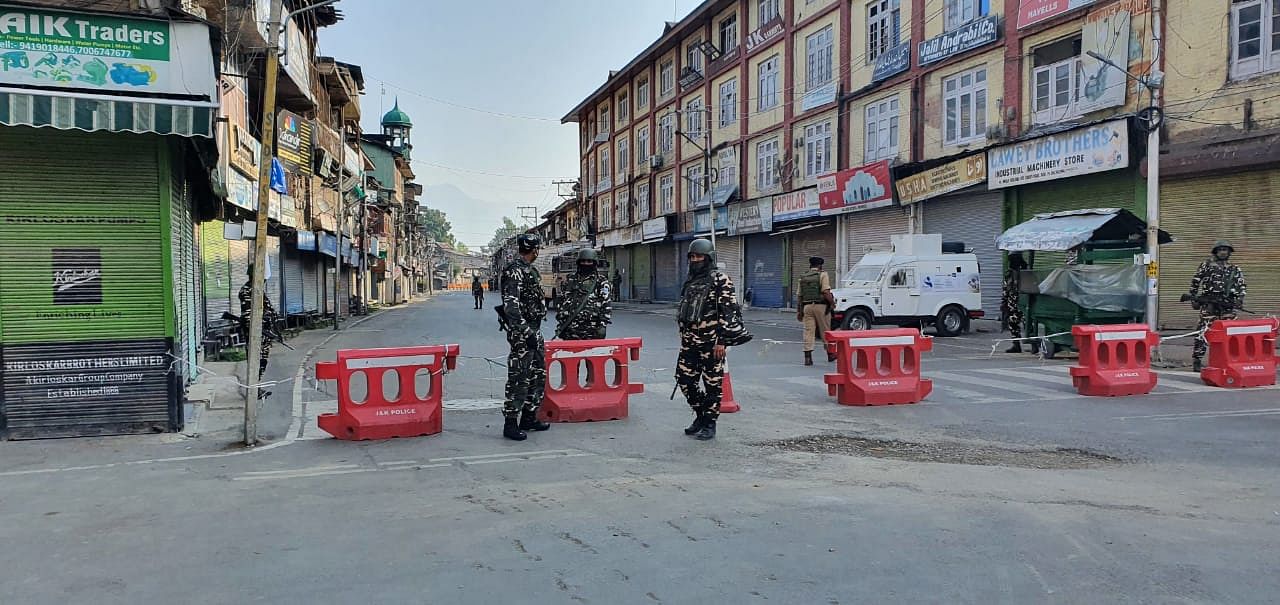 Apprehending protests in view of plans by separatists and regional political parties to observe August 5, the first anniversary of revocation of J&K’s special status under Article 370, as “black day”, authorities decided to impose a strict curfew on Tuesday and Wednesday. Credit: DH