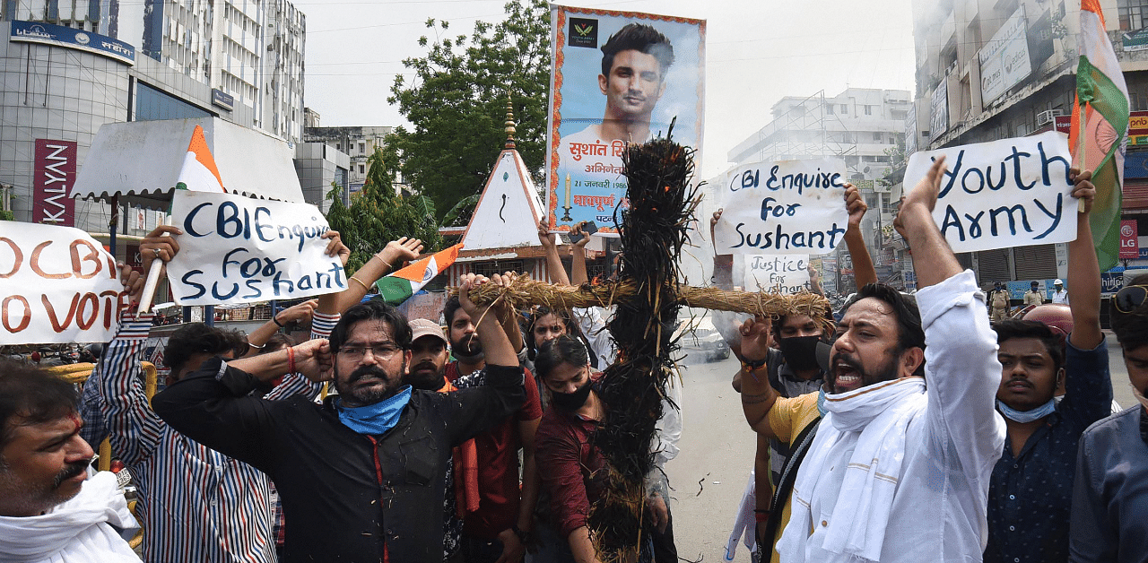 Fans of late Bollywood actor Sushant Singh Rajput stage a protest, demanding the CBI inquiry into the case, in Patna. Credit: PTI Photo