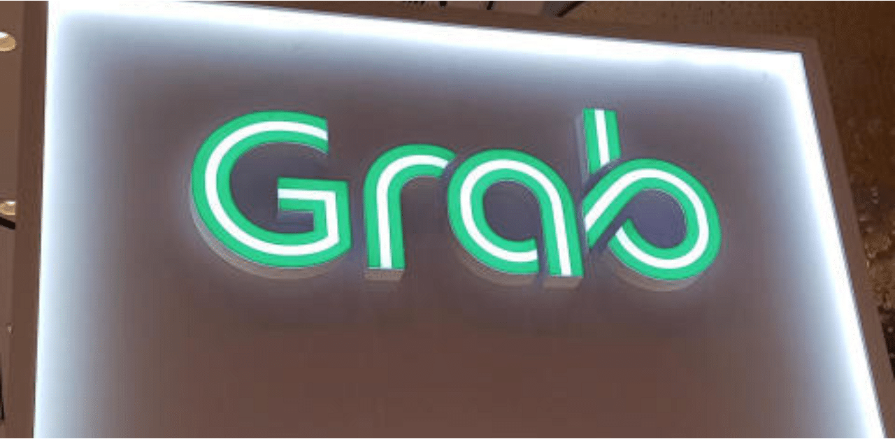 A Grab logo is pictured at the Money 20/20 Asia Fintech Trade Show in Singapore. Credit: Reuters Photo