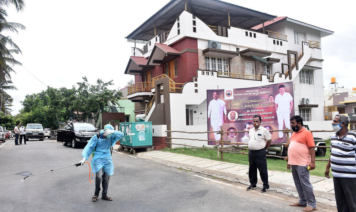 The house of Siddaramaiah at TK Layout in Mysuru was sealed down and sanitised on Tuesday. DH PHOTO