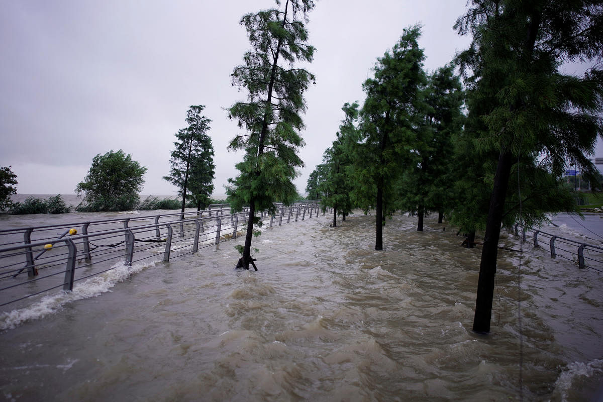 A view of floodwaters overflown to the banks of Tai Lake following heavy rainfall. Credit: Reuters