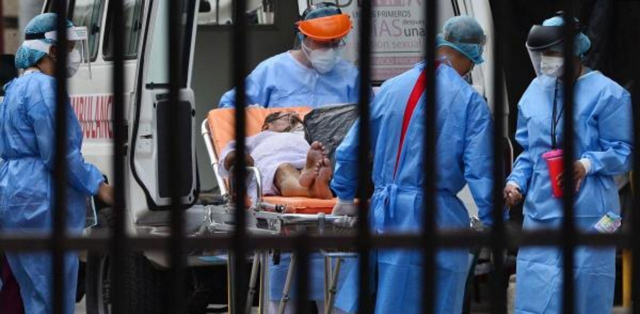 A patient arrives in an ambulance at the School Hospital in Tegucigalpa amid the novel coronavirus pandemic. Credit: AFP