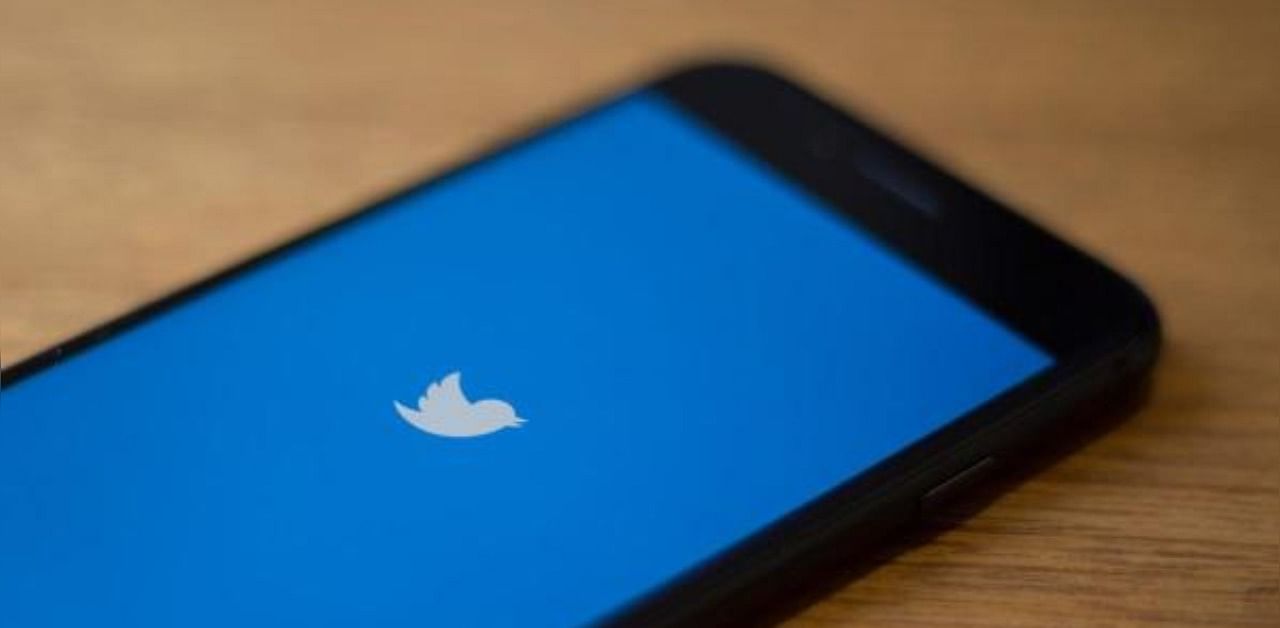 The Twitter logo is seen on a phone. Credit: AFP