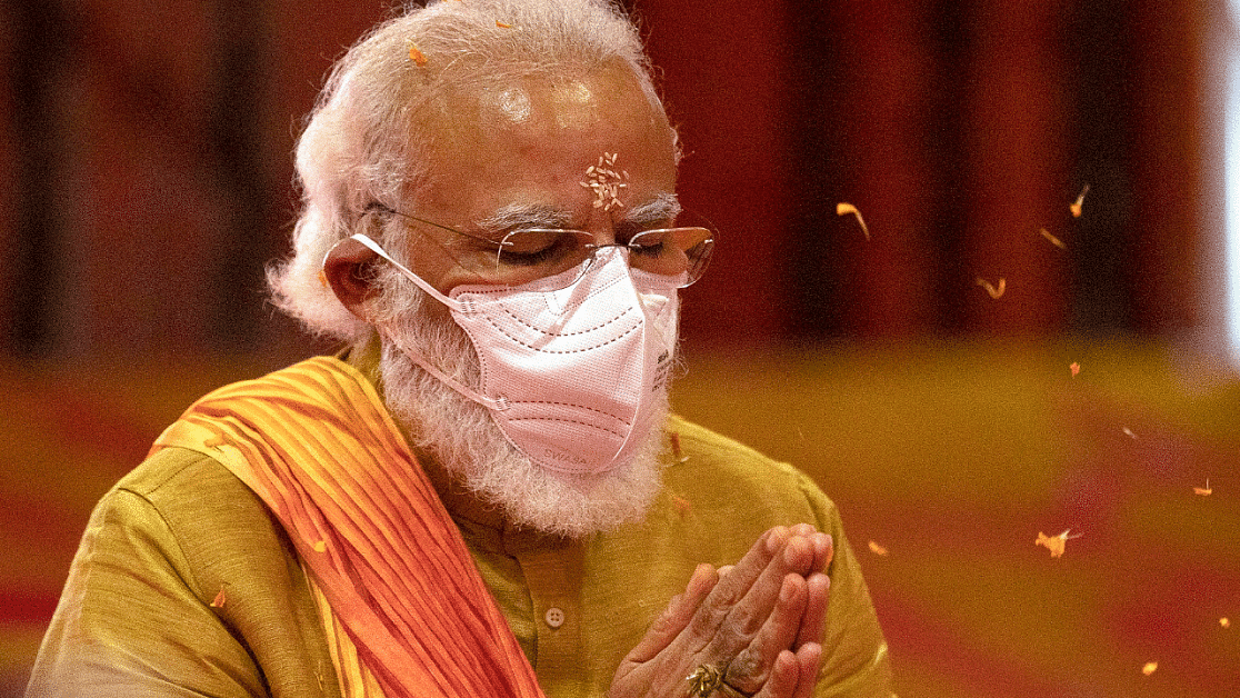 Prime Minister Narendra Modi performs rituals during the groundbreaking ceremony of a Ram Temple. Credits: AP Photo
