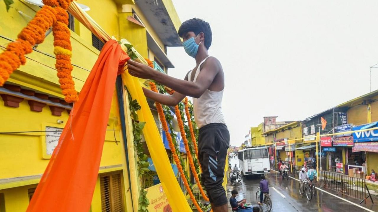 A street is decorated as preparations are in full swing for the ground breaking ceremony of Ram Mandir, in Ayodhya. Credit: PTI