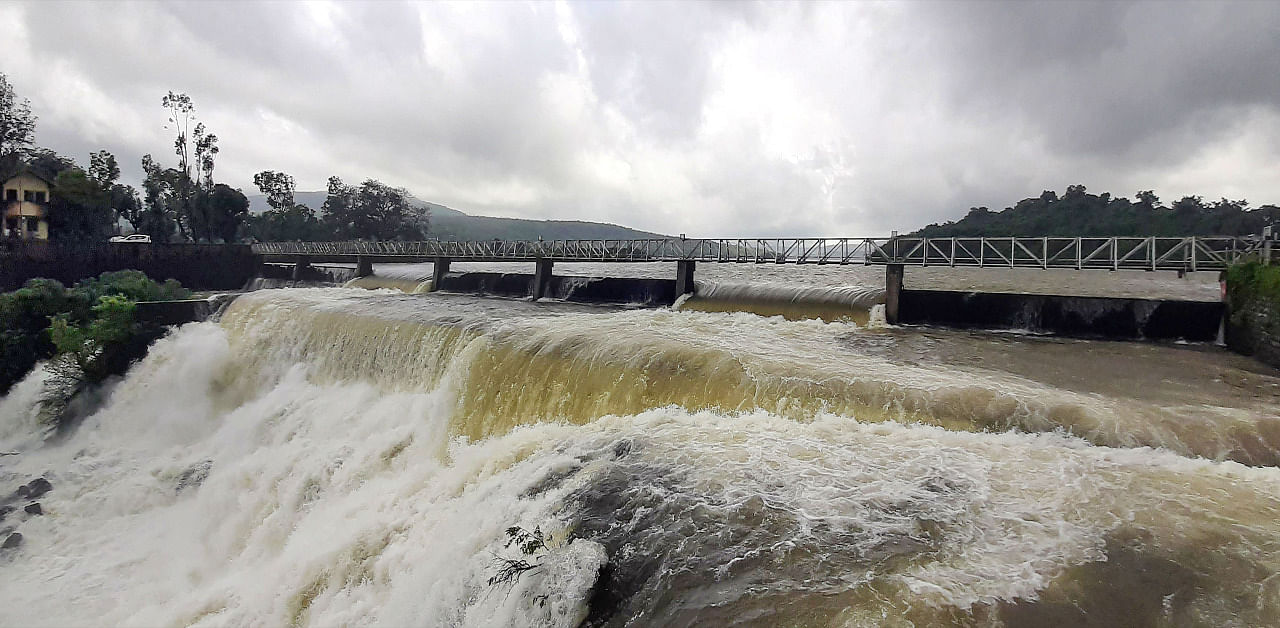 Water gushes out of the gates of Radhanagari Dam as water level rises due to heavy rains, in Kolhapur, Maharashtra in 2019. Credit: PTI