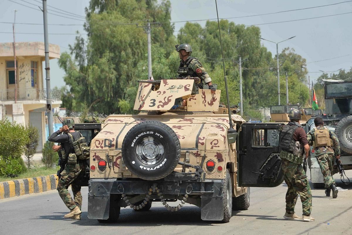 Afghan soldiers arrives with their Humvee vehicle outside a prison during an ongoing raid in Jalalabad on August 3, 2020. Credit: AFP Photo
