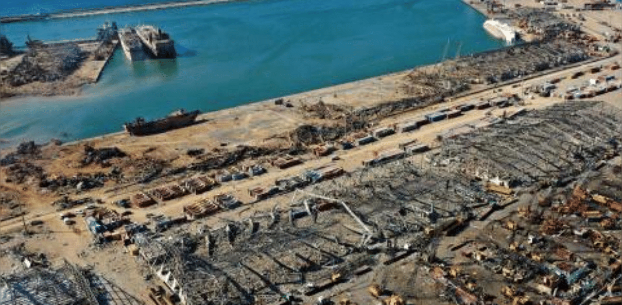 An aerial view shows the massive damage done to Beirut port's grain silos (C) and the area around it on August 5, 2020. Credit: AFP Photo