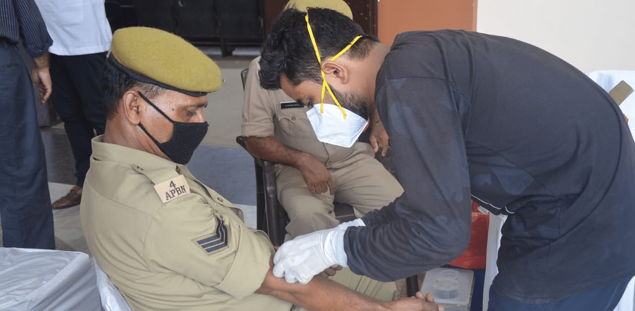 Recovered Assam cop donated plasma. Credit: DH Photo