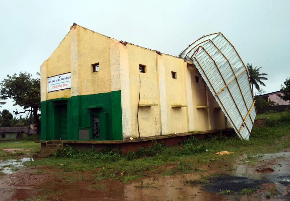The roof of the Primary Agriculture Credit Cooperative Society, blown away, due to heavy wind, in Sakleshpur taluk, Hassan district. DH PHOTO