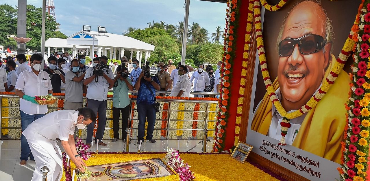 DMK leader MK Stalin pays tribute to the late M Karunanidhi on his second death anniversary, at his memorial in Chennai. Credit: PTI Photo