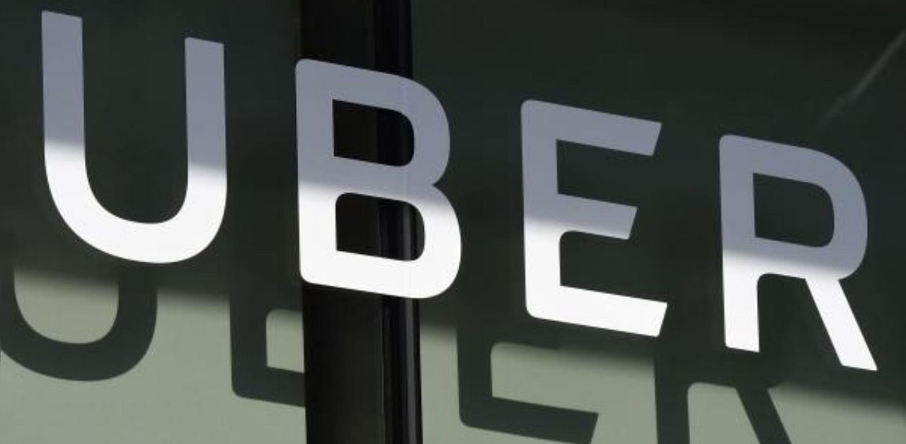 Uber logo. Credit: AFP