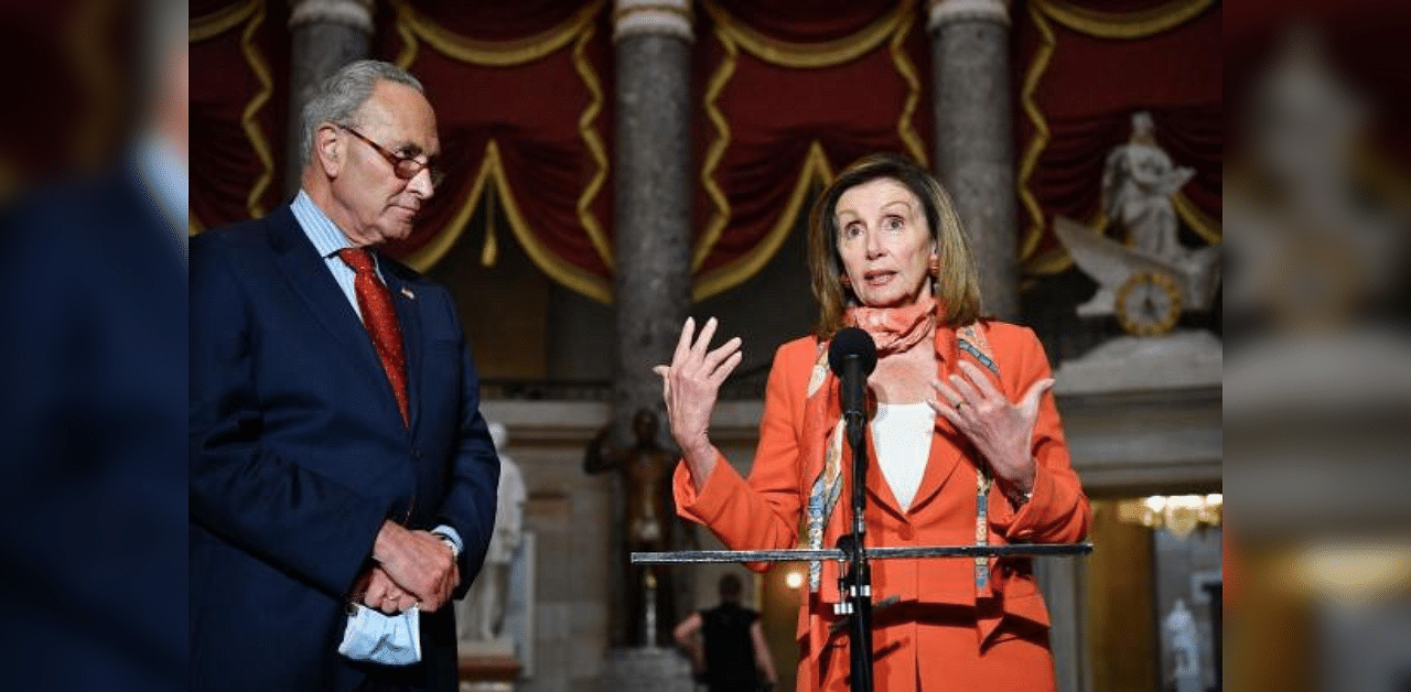 US House Speaker Nancy Pelosi and US Senate Minority Leader Chuck Schumer speak to reporters after meeting with Treasury Secretary Steven Mnuchin and White House Chief of Staff Mark Meadows on coronavirus relief talks. Credit: AFP Photo