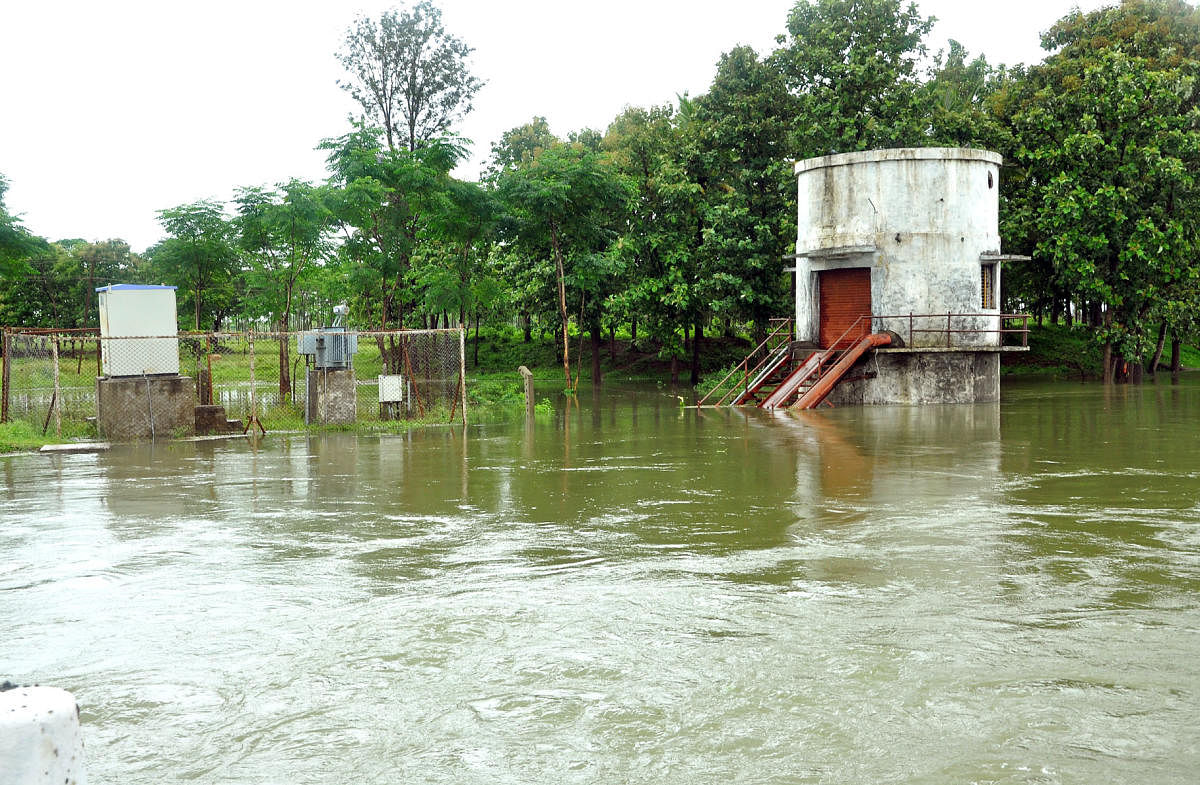 Madapur-Bellathur bridge comes under water in HD Kote taluk, Mysuru district, on Friday.
