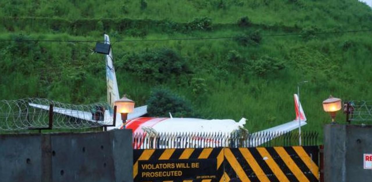 A gate near the wreckage of an Air India Express jet at Calicut International Airport. Credit: AFP