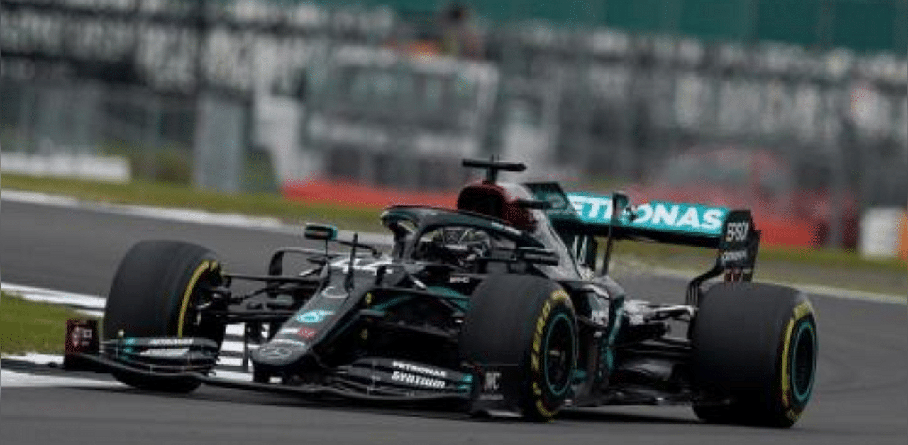 Mercedes' British driver Lewis Hamilton steers his car during the second practice session of the F1 70th Anniversary Grand Prix at Silverstone. Credit: AFP Photo