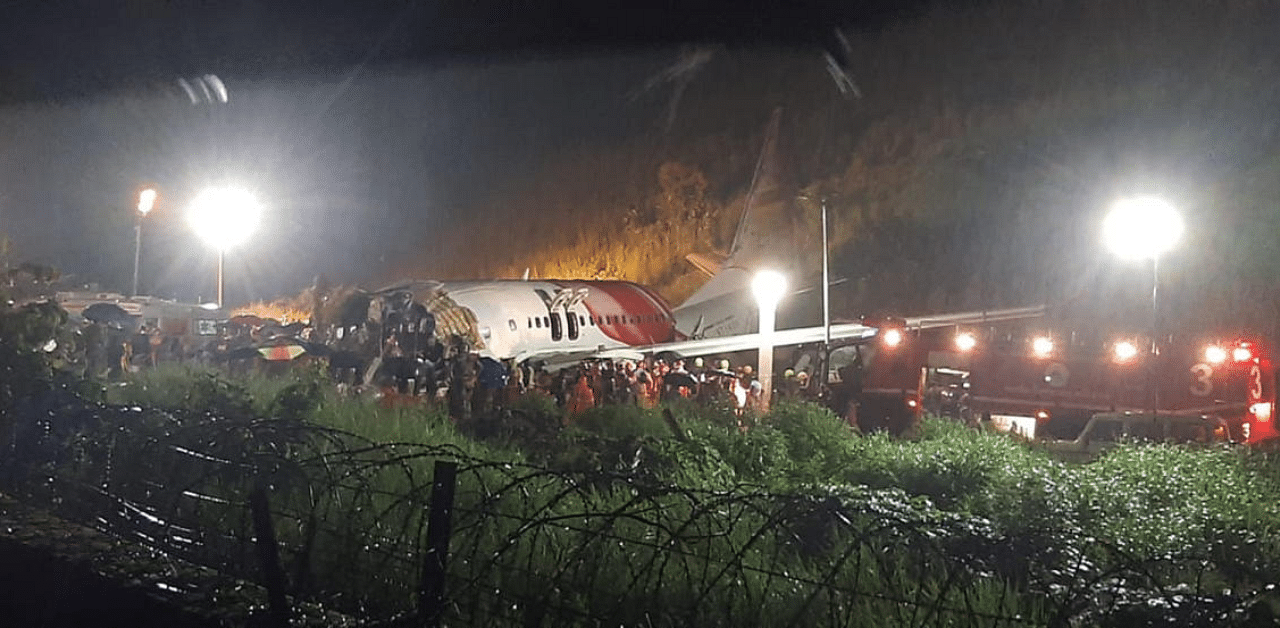 The Air India Express flight that skidded off a runway while landing at the airport in Kozhikode, Kerala. Credit: AP/PTI Photo