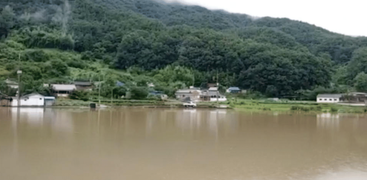 General view shows flooding along Seomjin River amid monsoon rains, in Duga-ri, South Korea. Credit: Reuters
