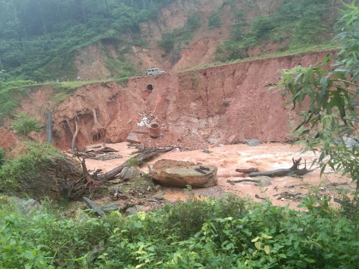 A landslide occurred on Madikeri - Mangaluru National Highway 275, near Jodupala.