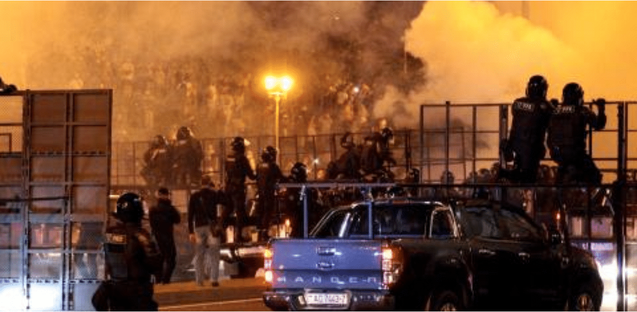 Riot police disperse protesters after polls closed in the presidential election, in Minsk. Credit: AFP Photo