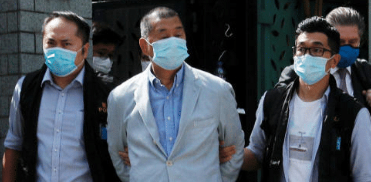 Media mogul Jimmy Lai Chee-ying, founder of Apple Daily (C) is detained by the national security unit in Hong Kong. Credit: Reuters Photo