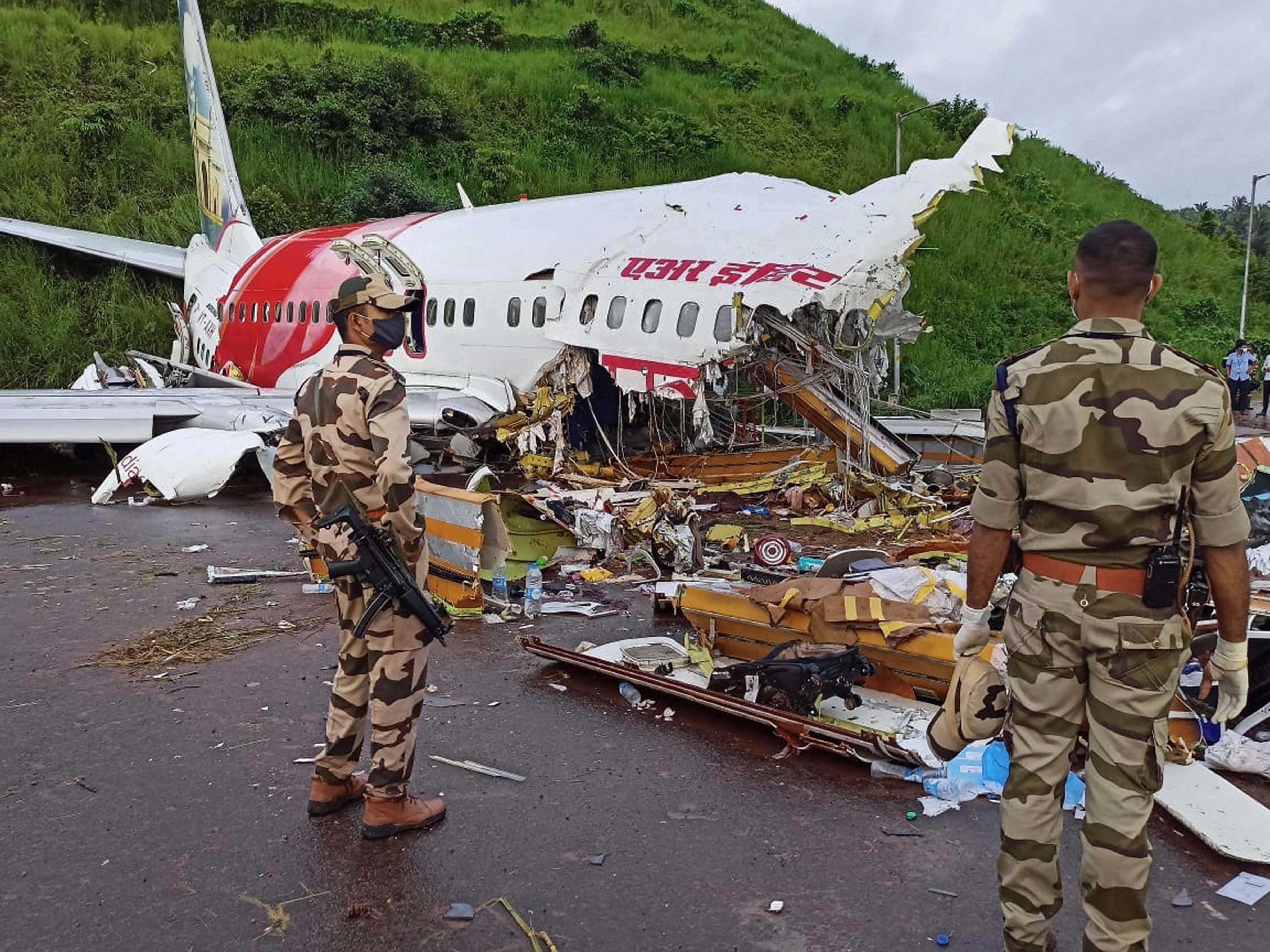 Those involved in the rescue work after the Air India Express flight from Dubai with 190 people on board crashed at the Karipur airport here have been advised to go on quarantine after samples of one of the passenger who died tested positive for Covid-19. Credit: PTI Photo