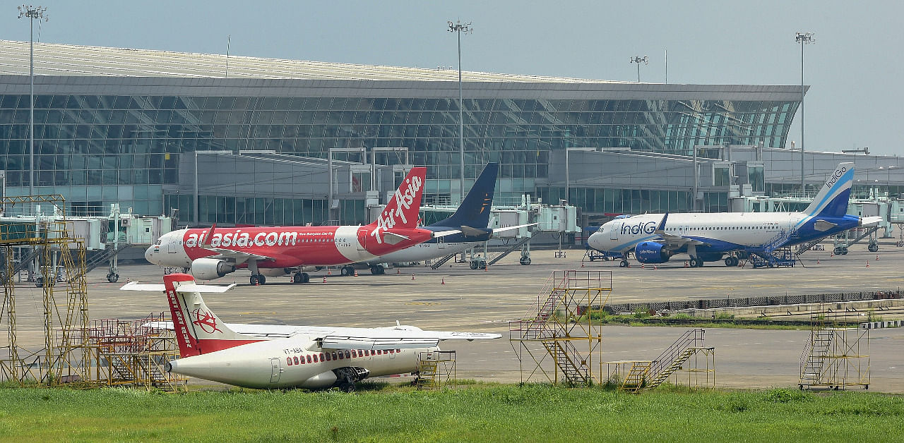 Aeroplanes are parked on the runway at NSCBI Airport in Kolkata. Credit: PTI Photo