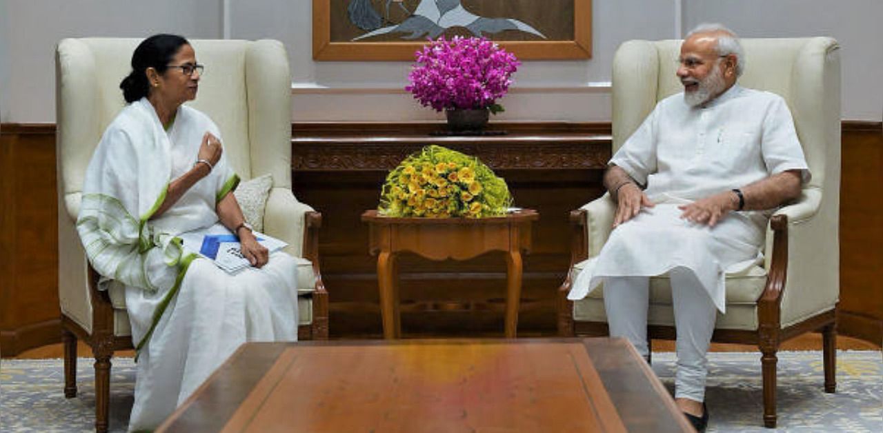 Prime Minister Narendra Modi during a previous meeting with West Bengal Chief Minister Mamata Banerjee. Credit: PTI Photo